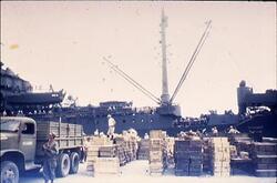 アメリカ輸送船から横浜港に荷上げされる物資 / Supplies Being Unloaded from an American Transport Ship to the Port of Yokohama image