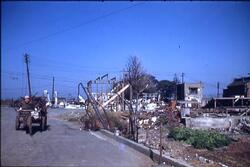 リヤカーで鉄くずを運ぶ男性 / Man Transporting Scrap Metal in a Handcart image