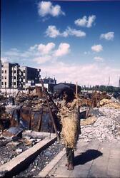 焼け跡で、ワラで体を包んだ男性 2 / Man Wrapped in Straw at the Burnt Ruins 2 image