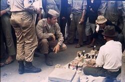 ヤミ市の商品を見るアメリカ兵 / American Soldiers Looking at Black Market Goods image