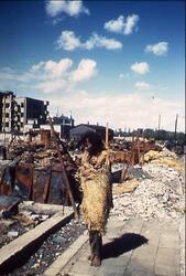 焼け跡でワラで体を包んだ男性 2 / Man Wrapped in Straw at the Burnt Ruins 2 image
