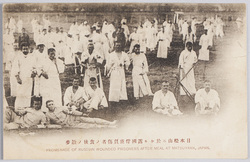 日本松山ニ於ケル露国俘虜負傷者ノ食後ノ散歩 ROMENADE OF RUSSIAN WOUNDED PRISONERS AFTER MEAL AT MATSUYAMA, JAPAN. / Wounded Russian Captives Taking a Walk after Their Meal in Matsuyama, Japan image