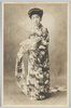 帯を結ぶ和装女性/Woman in Kimono Tying an Obi image