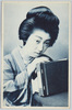 アルバムを持つ和装女性/Woman in Kimono Holding an Album image