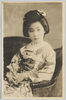 肘掛け椅子に座る和装女性/Woman in Kimono Sitting on an Armchair image