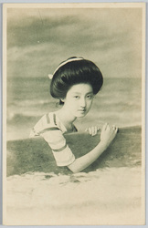 板を持つ水着の女性 / Woman in a Swimsuit Holding a Board image