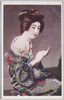 化粧をする和装女性/Woman in Kimono Applying Makeup image
