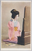鏡台の前の和装女性/Woman in Kimono in Front of a Mirror image