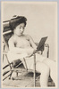 籐椅子に座る女性/Woman Sitting in a Wicker Chair image
