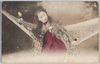 ハンモックに座る和装女性/Woman in Kimono Sitting in a Hammock image