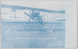 HAMILTON REDY FOR FLIGHT IN CURTISS BIPLANE 1548 image