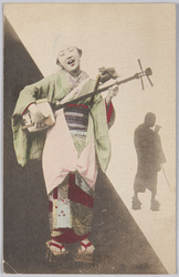 三味線を弾く女性 / Woman Playing Shamisen (Japanese String Instrument) image