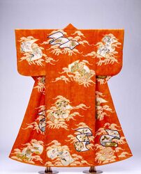 緋綸子地松巻絹文様染繍絞小袖 / Scarlet Figured Satin Kosode Kimono with Pine Trees and Rolls of Silk in Simple-Stitch Shaped Resist (Shibori) image