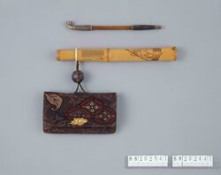 木綿相良繍花菱文腰差したばこ入れ / Cotton Tobacco Pouch with Sagara Embroidery of Diamond-Shaped Flower Motif Pattern, with Pipe Case image