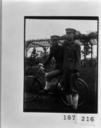 自転車上の少年と直立する少年 / Boy on Bicycle and Boy Standing image