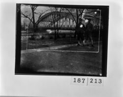 河川沿いに立つ少年2人 / Two Boys Standing Beside a River image