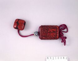 松下馬上人物堆朱印籠 付 菊花文様堆朱根付 / Carved Cinnabar Lacquer Inro (Small Nested Caddy) with Mounted Figure and Pine Tree; Chrysanthemum Design Carved Cinnabar Lacquer Netsuke Toggle image