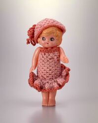 セルロイド人形 巻髪女子(毛糸衣装付) / Celluloid Doll, Curly Haired Girl (with Knitted Clothes) image