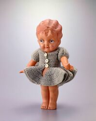 セルロイド人形 巻髪女子(毛糸衣装付) / Celluloid Doll, Curly Haired Girl (with Knitted Clothes) image