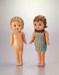 セルロイド人形 巻髪女子(毛糸衣装付) / Celluloid Doll, Curly Haired Girl (with Knitted Clothes) image