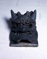 旧浅草寺観音堂降り棟鬼瓦(降り隅) / Onigawara (Ogre-Faced Roof Tile) of Descending Corner Ridge at Former Sensōji Temple Kannondō Hall (Kudarioni) image