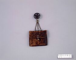 鞣革隠れ切支丹金具一つ提げたばこ入れ / Suede Tobacco Pouch with Secret Christian Metal Clip, with Netsuke image